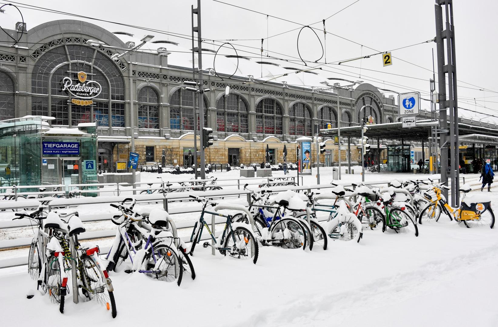 Heavy snowfalls in Germany Snow covered bicycles stand near the main station after  heavy snowfalls in Dresden, Germany, February 8, 2021.   REUTERS/Matthias Rietschel MATTHIAS RIETSCHEL