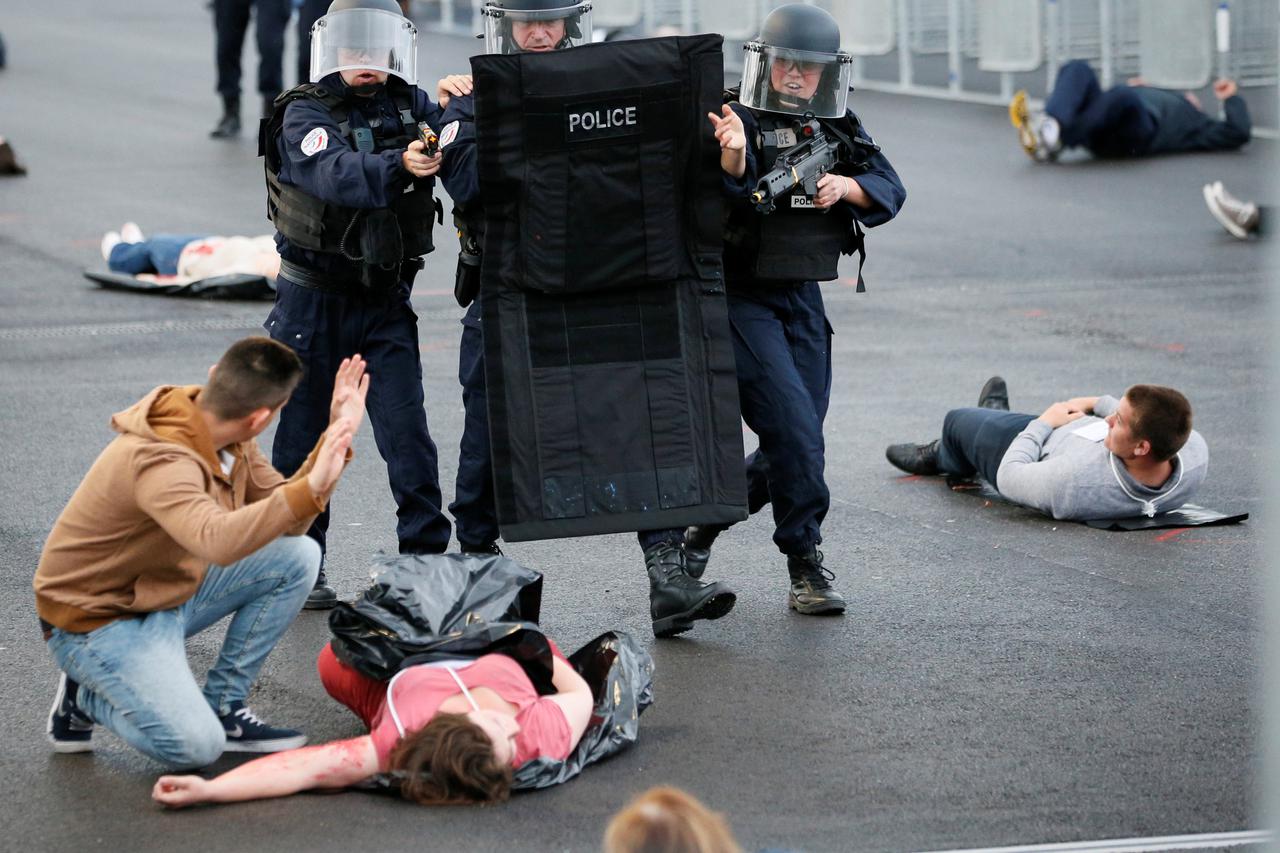 French Police forces take part in a mock attack drill outside the Grand Stade stadium (aka Parc Olympique Lyonnais or the Stade des Lumieres) in Decines, near Lyon, France, in preparation of security measures for the UEFA 2016 European Championship May 30