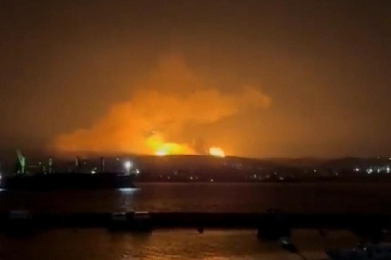 A fire burns following an explosion at a site in Tartus