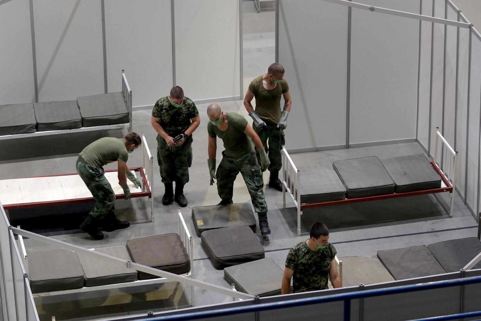 06, July, 2020, Belgrade - The Ministry of Health and the Army of the Republic of Serbia are setting up military beds in the Stark Arena to form a temporary covid hospital for people who have mild symptoms of the coronavirus. Photo: Antonio Ahel/ATAImages/PIXSELL

06, jul,2020, Beograd - Ministarstvo zdravlja i Vojska Republike Srbije namestaju vojne krevete u Stark areni za formiranje privremene kovid bolnice za ljude koji imaju blaze simtome korona virusa. Photo: Antonio Ahel/ATAImages/PIXSELL