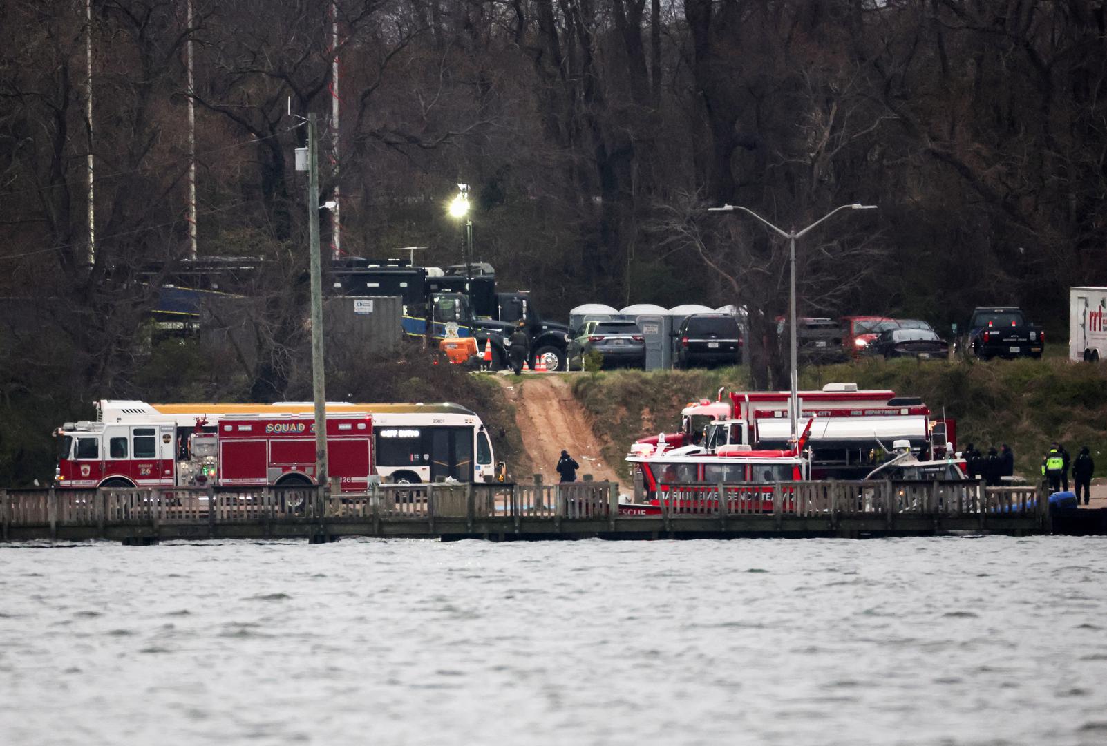 Emergency vehicles are parked near the scene of the Francis Scott Key Bridge collapse in Baltimore, Maryland, U.S., March 27, 2024. REUTERS/Mike Segar Photo: MIKE SEGAR/REUTERS