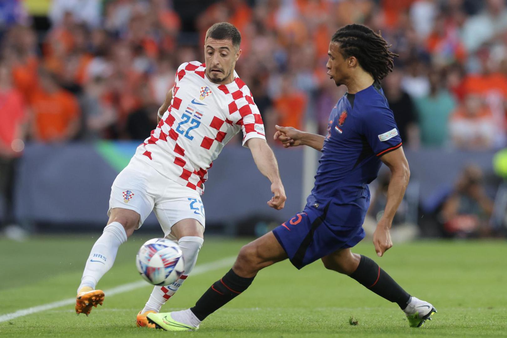 14.06.2023., stadion Feyenoord "De Kuip", Rotterdam, Nizozemska - UEFA Liga Nacija, polufinale, Nizozemska - Hrvatska. Josip Juranovic, Nathan Ake Photo: Luka Stanzl/PIXSELL