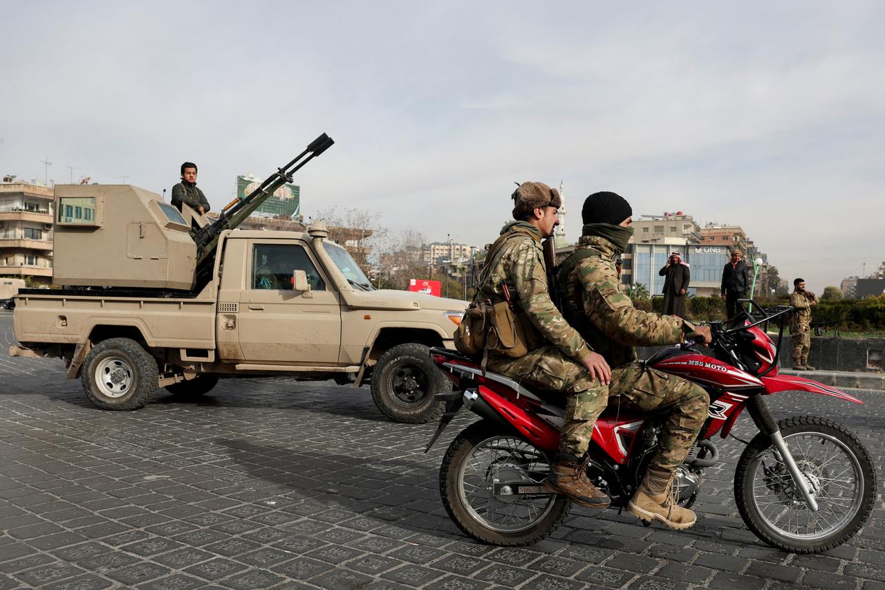 Scenes from Abbasiyyin Square, after rebels seized the capital and ousted Syria's Bashar al-Assad, in Damascus