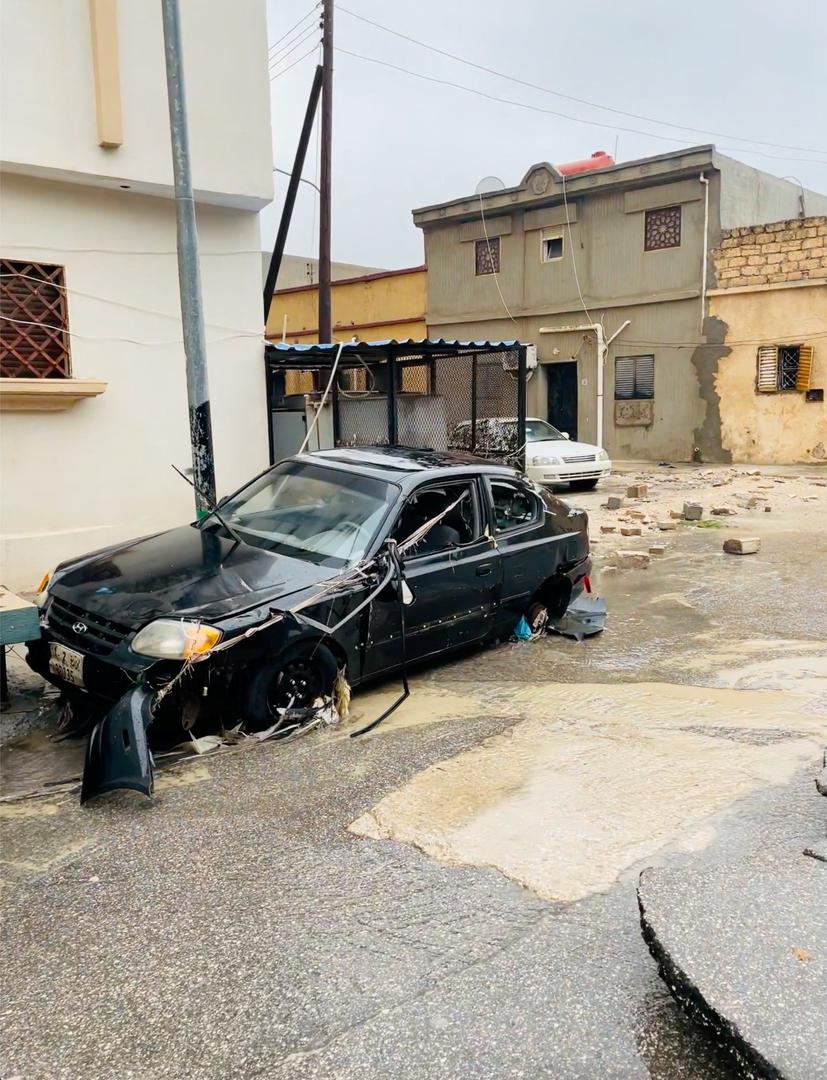 A view shows a damaged car on a broken road, after a powerful storm and heavy rainfall hit, in Al Bayda, Libya, September 11, 2023, in this screengrab obtained from social media video. Instagram/@EX5TWD via REUTERS. ATTENTION EDITORS - THIS IMAGE HAS BEEN SUPPLIED BY A THIRD PARTY. MANDATORY CREDIT. NO RESALES. NO ARCHIVES Photo: INSTAGRAM/@EX5TWD/REUTERS