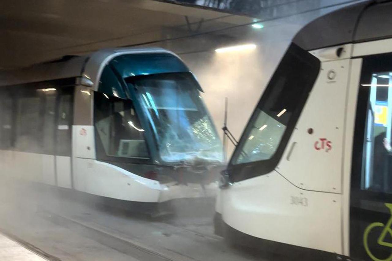 Damaged trams lie at a standstill after a colliding at a train station, in Strasbourg