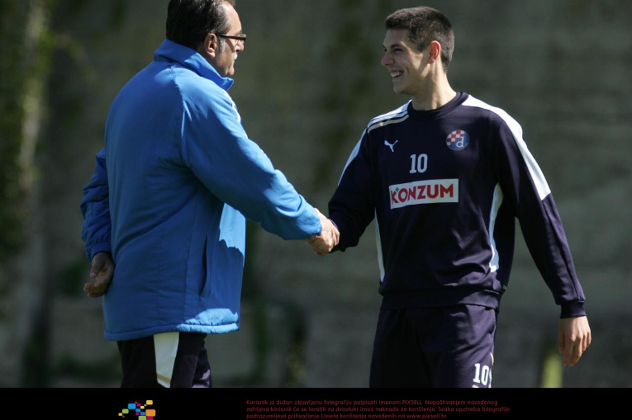 '10.04.2012., Maksimirska 128, Zagreb - Na pomocnom igralistu Hitrec Kacijan nogometasi Dinama odradili su jutarnji trening. Ante Cacic, Ante Rukavina. Photo: Sanjin Strukic/PIXSELL'