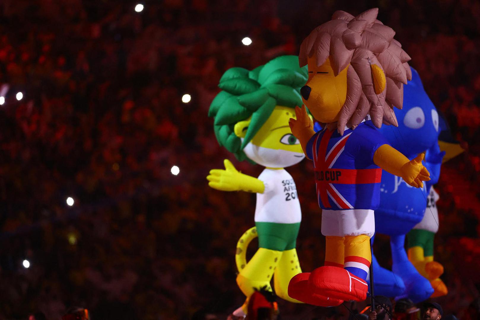 Soccer Football - FIFA World Cup Qatar 2022 - Group A - Qatar v Ecuador - Al Bayt Stadium, Al Khor, Qatar - November 20, 2022 General view of inflatable mascots of previous World Cups during the opening ceremony REUTERS/Kai Pfaffenbach Photo: Kai Pfaffenbach/REUTERS