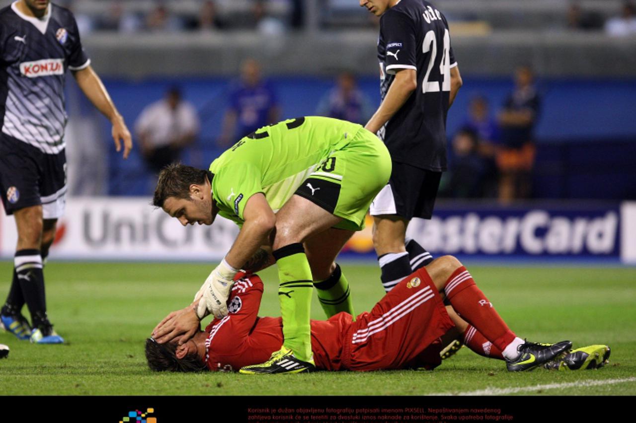 '14. 09. 2011., Zagreb - stadion u Maksimiru, Zagreb - 1. kolo UEFA Lige prvaka, nogometna utakmica GNK Dinamo - Real Madrid.  Ivan Kelava, Sergio Ramos Photo: Slavko Midzor/PIXSELL'