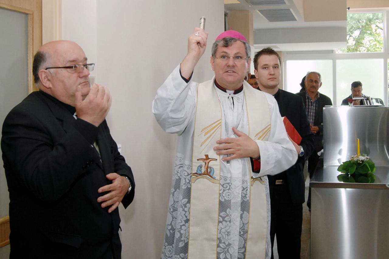 \'05.05.2011., Sisak - Novourdjeni prostor Caritasa Sisacke biskupije na Trgu Vere Grozaj blagoslovio je sisacki biskup mons.dr.Vlado Kosic. Photo:Nikola Cutuk/PIXSELL\'