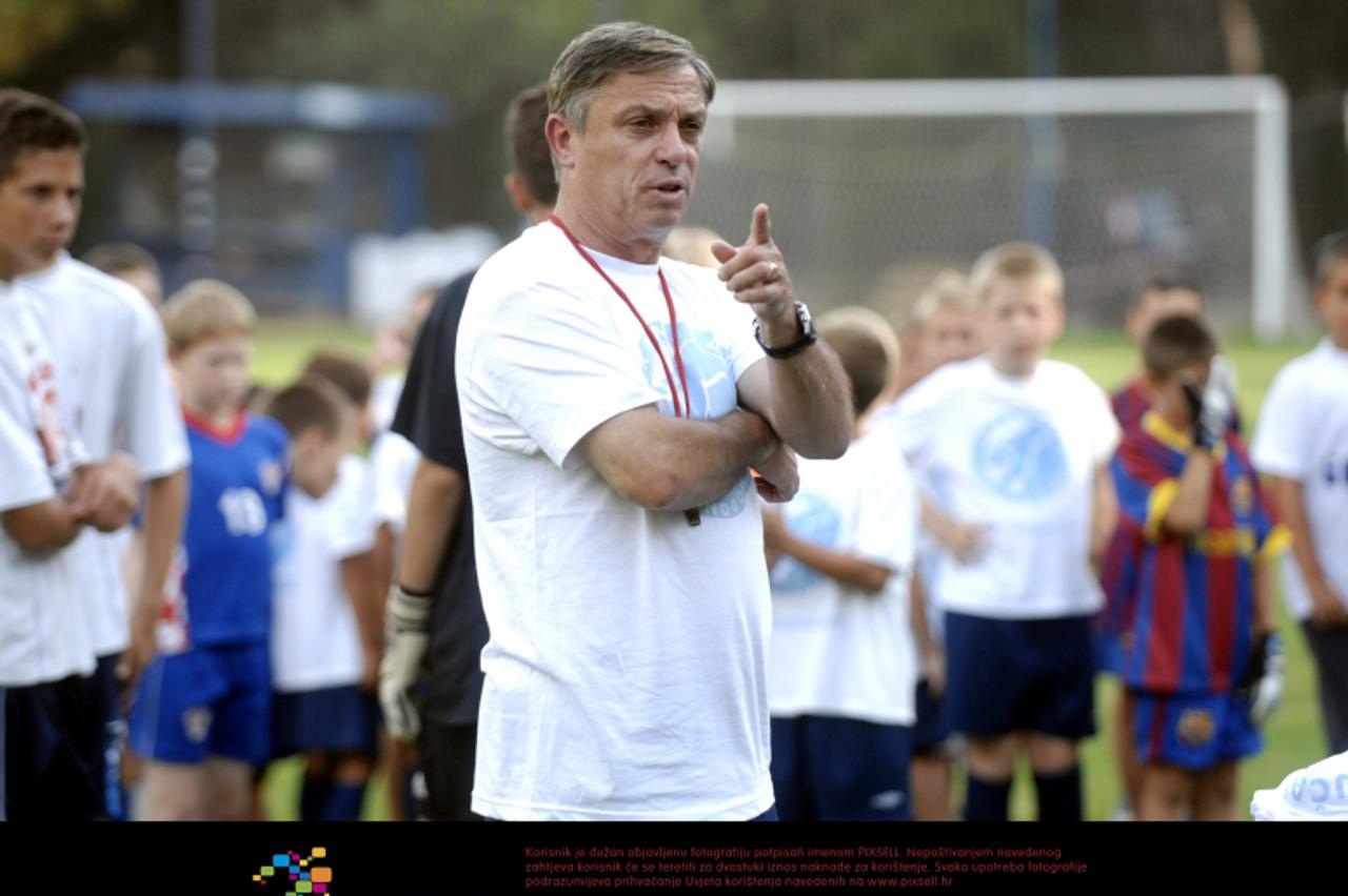 '30.06.2011. Mali Losinj - Skola nogometa Kranjcar. Niko i Zlatko Cico Kranjcar odrzali su prvi trening sa polaznicima skole nogometa. Photo: Goran Kovacic/PIXSELL'