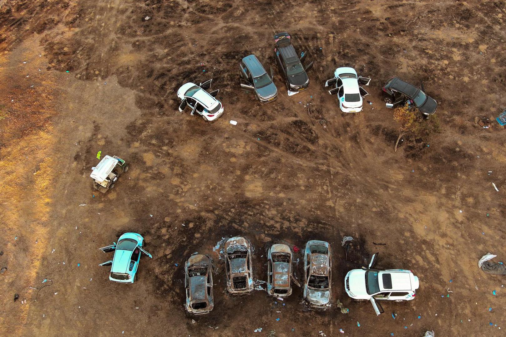 An aerial view shows the burnt cars of festival-goers at the site of an attack on the Nova Festival by Hamas gunmen from Gaza, near Israel's border with the Gaza Strip, in southern Israel, October 12, 2023. REUTERS/Ilan Rosenberg Photo: ILAN ROSENBERG/REUTERS