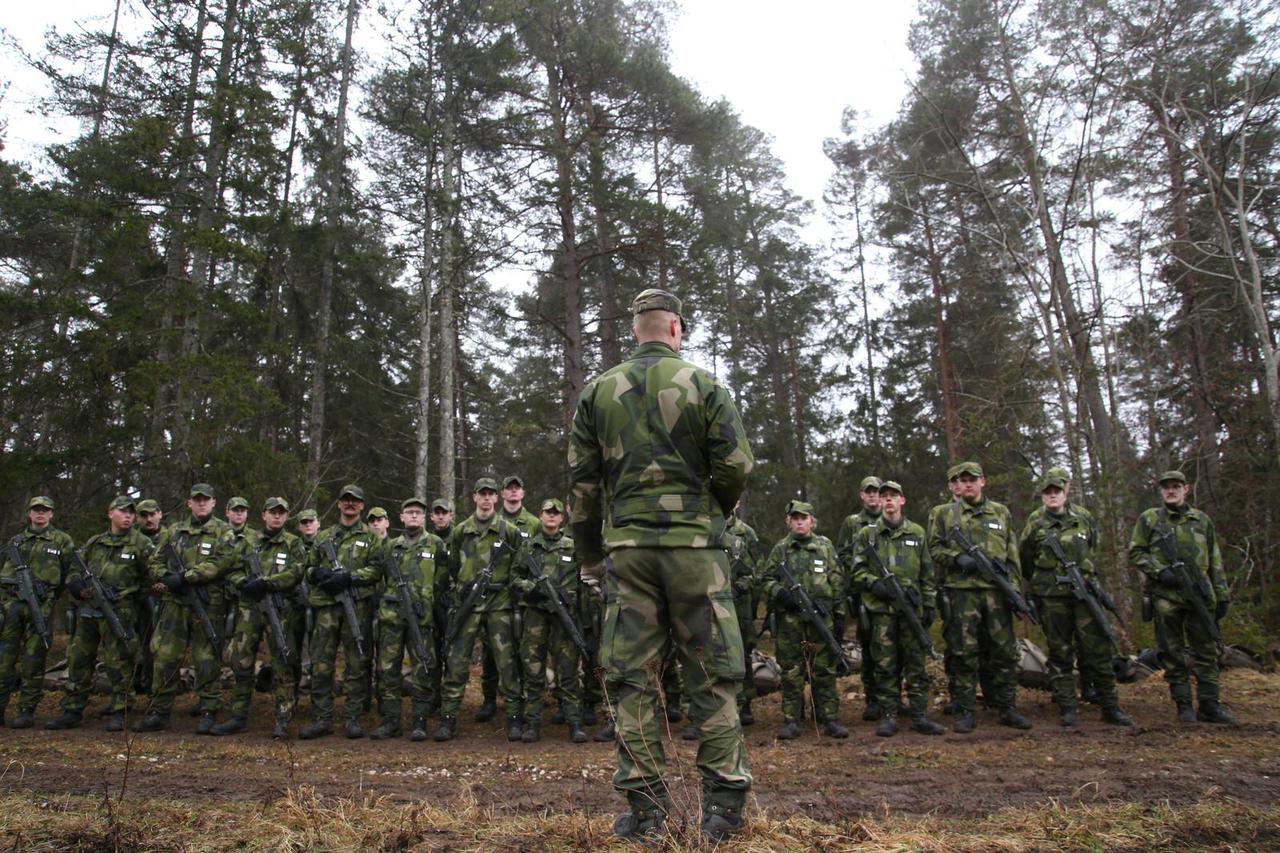 The Gotland regiment trains in a wood outside Visby on the Baltic island of Gotland