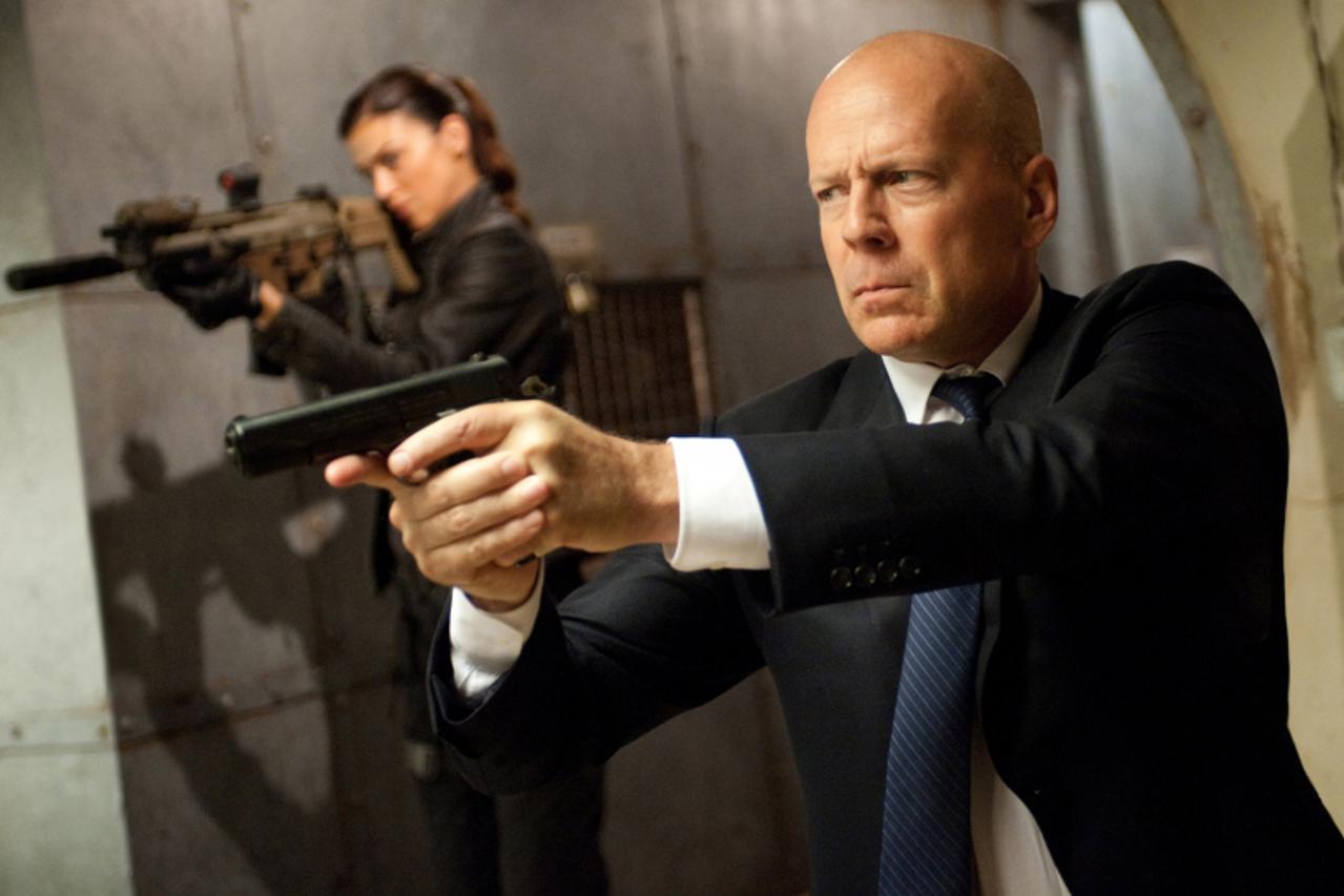 'Left to right: Adrianne Palicki plays Lady Jaye and Bruce Willis plays Colton in G.I. JOE: RETALIATION, from Paramount Pictures, MGM, and Skydance Productions.'