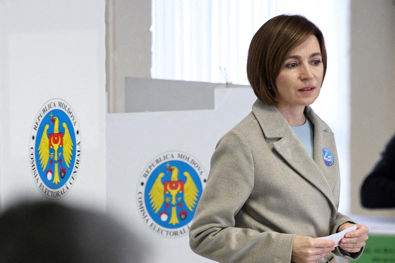 FILE PHOTO: Moldovan President Maia Sandu votes in Moldova's presidential election