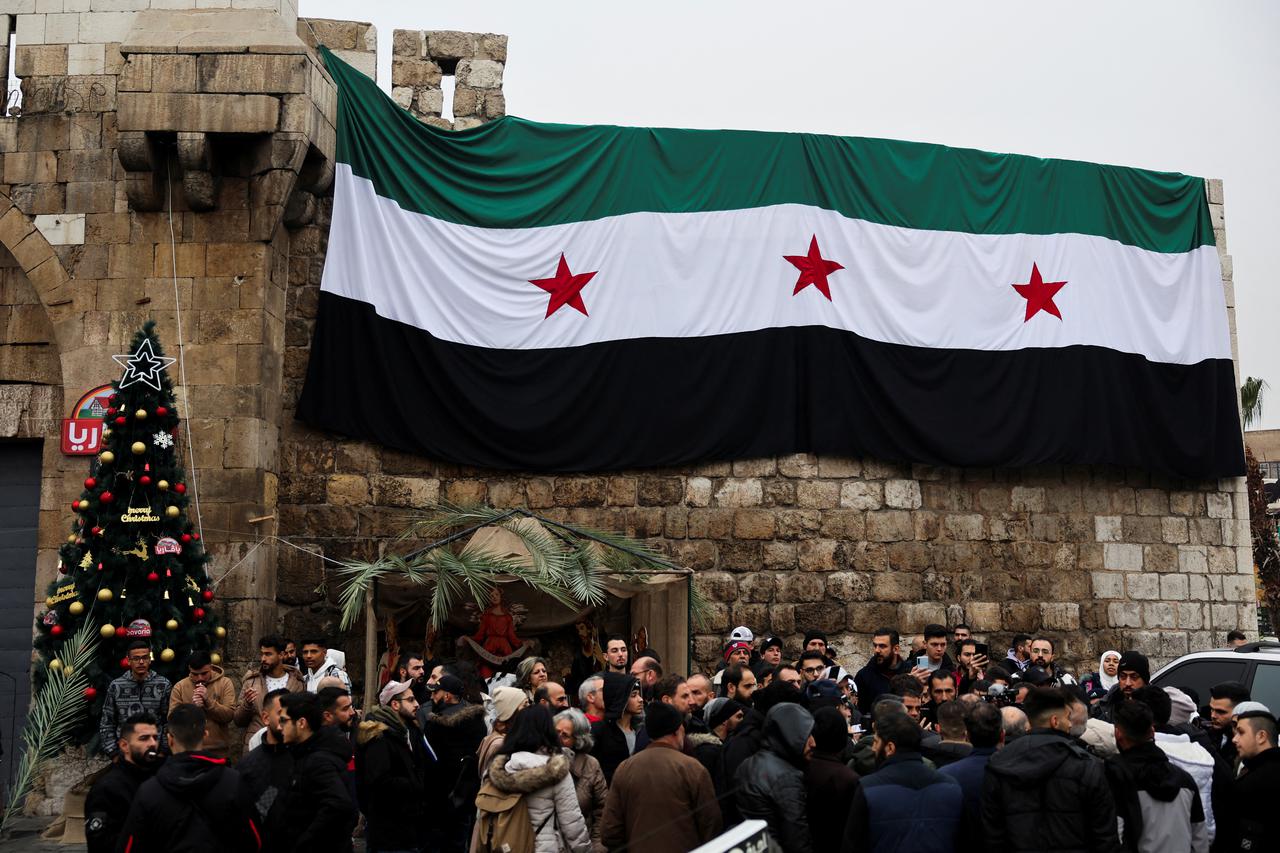 Protest against the burning of the Christmas tree in Hama, in Damascus