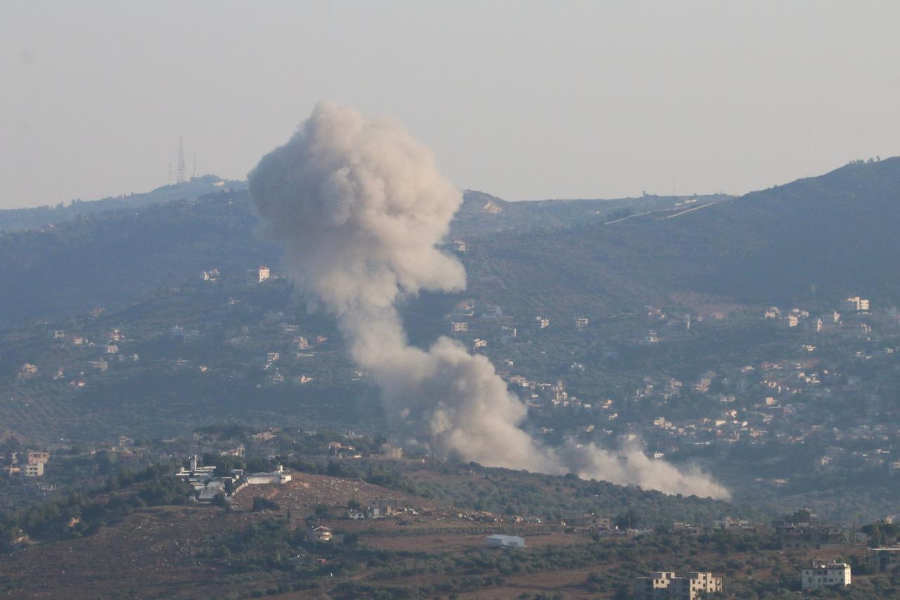 Smoke rises from Kfar Kila, amid cross-border hostilities between Hezbollah and Israeli forces, as pictured from Marjayoun, near the border with Israel