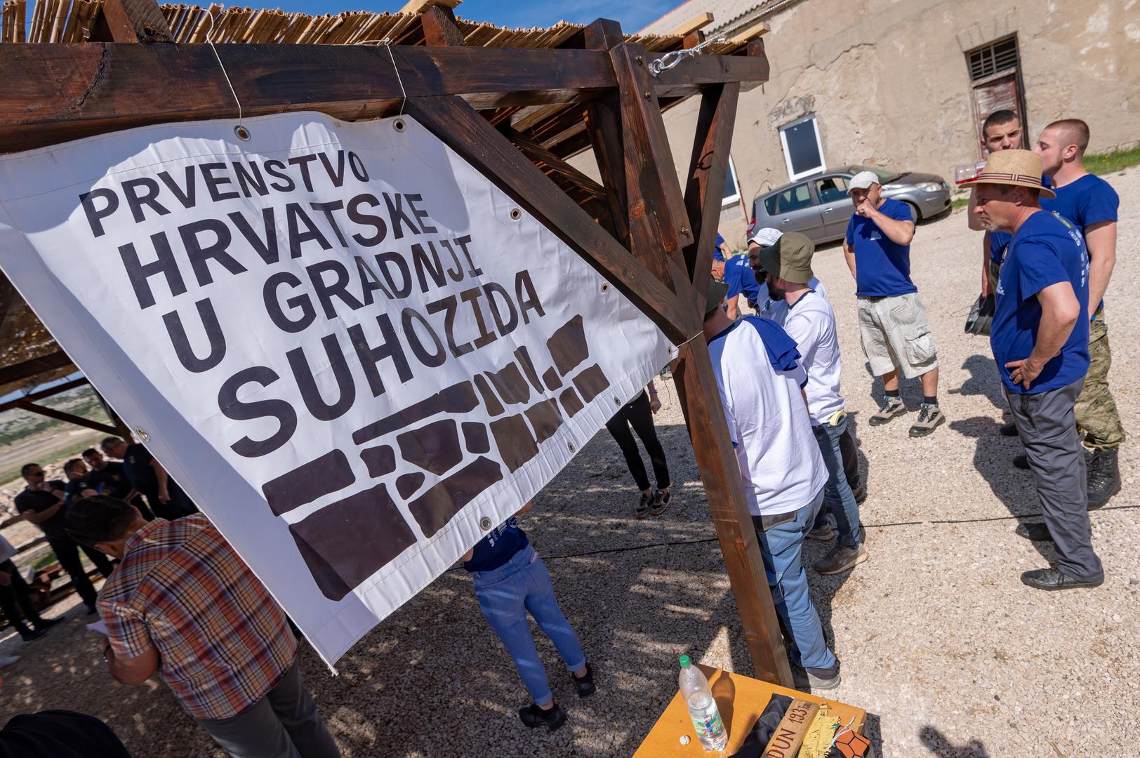 06.05.2023., Pag - U krugu Solane Pag odrzano je drzavno prvenstvo u starim vjestinama izgradnje suhozida.  Photo: Dino Stanin/PIXSELL