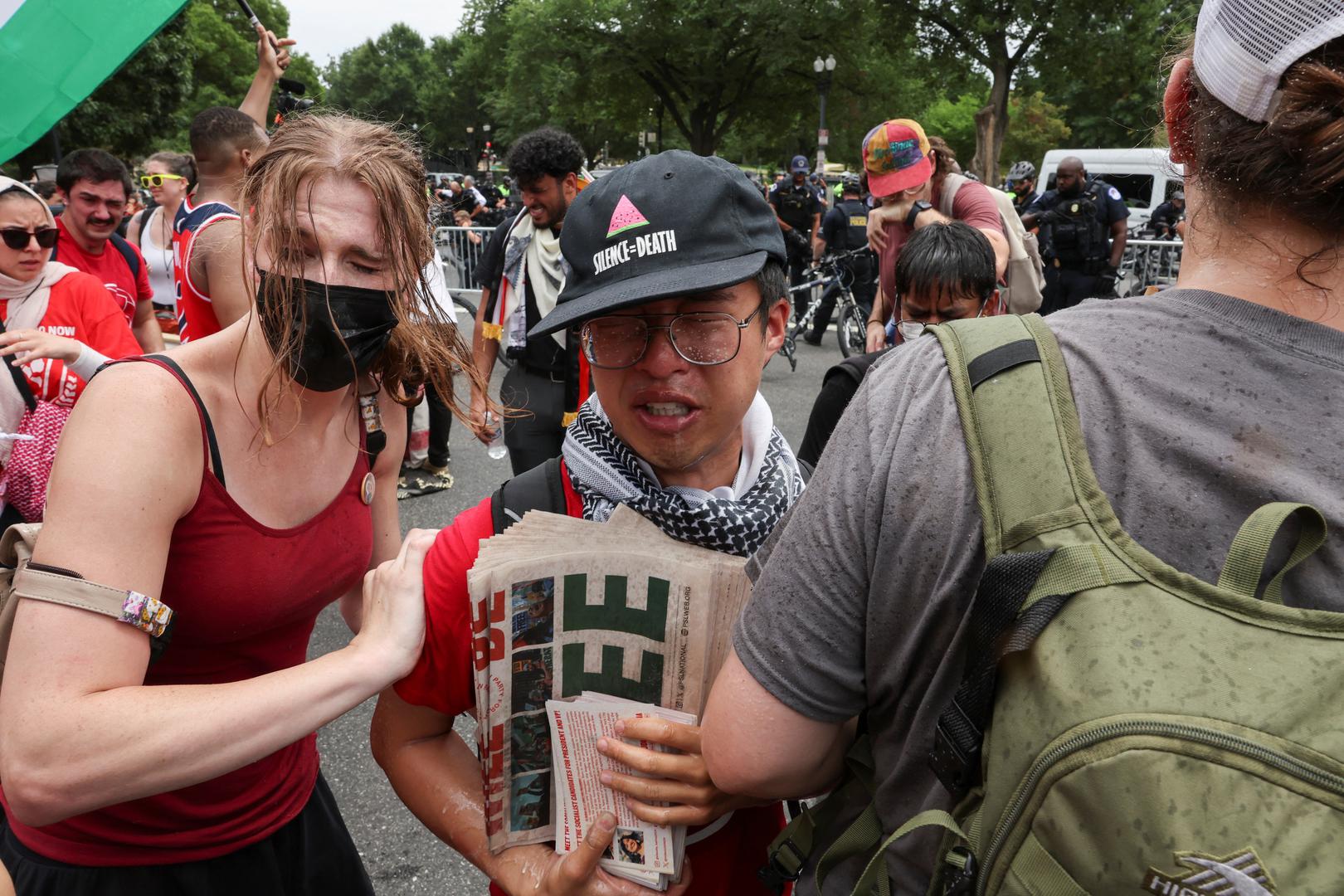 Pro-Palestinian demonstrators react from pepper spray deployed by U.S. Capitol Police, on the day Israeli Prime Minister Benjamin Netanyahu addresses a joint meeting of Congress, on Capitol Hill, in Washington, U.S., July 24, 2024. REUTERS/Umit Bektas Photo: UMIT BEKTAS/REUTERS