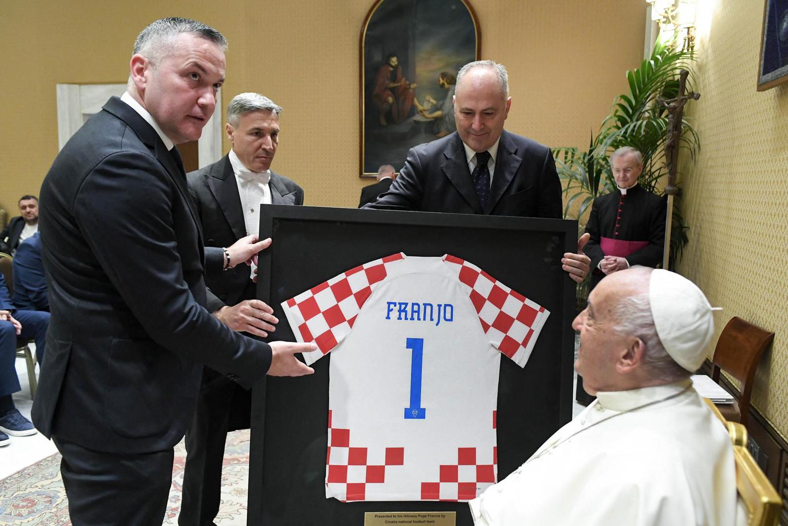 The president of Croatian Football Federation, Marijan Kustic, presents the Pope Francis with a symbolic gift, a Croatian national team jersey during a meeting of the pope with the players of the Croatian National Football Team at the Vatican on June 5, 2024. The Pope praised the Croatian team for their achievements, such as their third-place finish at the last World Cup in Qatar. The Croatians also received his blessing ahead of Euro 2024, which will soon be hosted by Germany. Photo: (EV) Vatican Media/ABACAPRESS.COM Photo: ABACA/ABACA