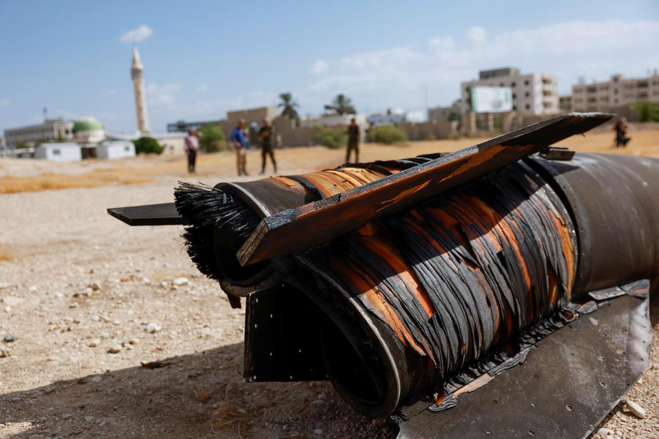 A projectile lies on the ground a day after Iran fired a salvo of ballistic missiles against Israel, in Jericho, in the Israeli-occupied West Bank