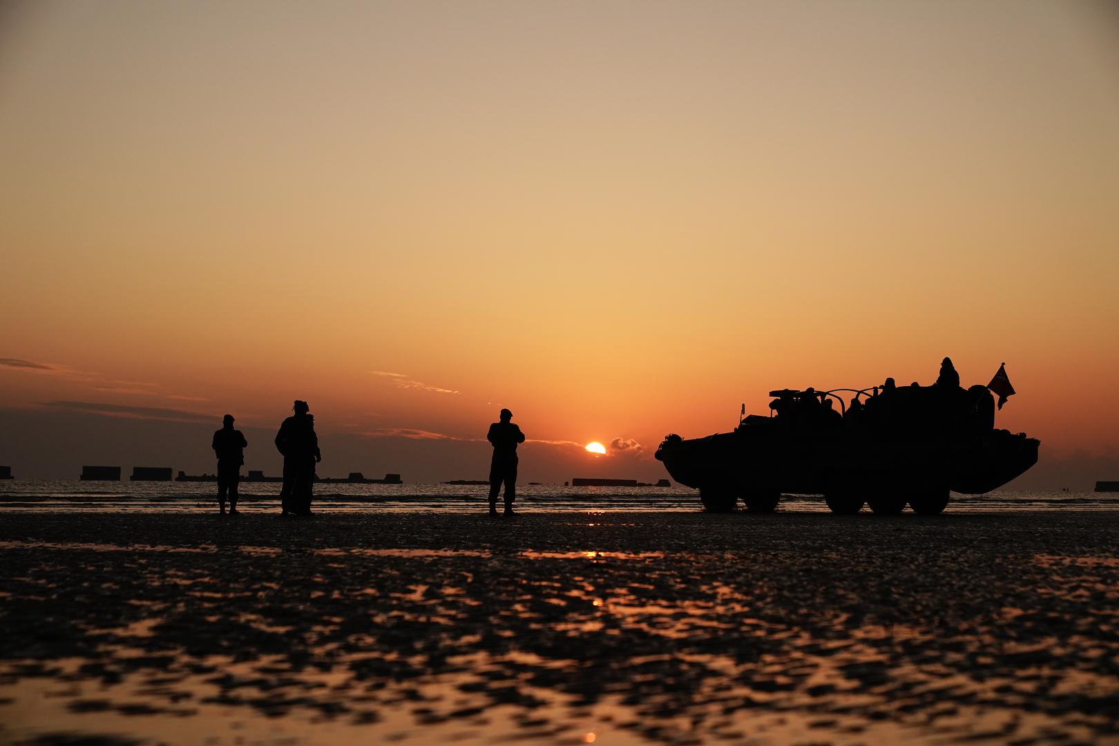 Re-enactors on Gold Beach in Arromanches at sunrise in Normandy, France, to commemorate the 80th anniversary of the D-Day landings. Picture date: Thursday June 6, 2024. Photo: Aaron Chown/PRESS ASSOCIATION