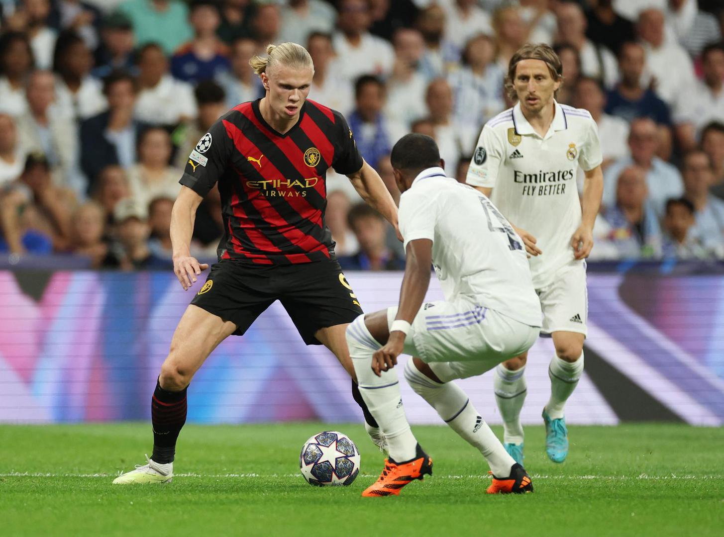 Soccer Football - Champions League - Semi Final - First Leg - Real Madrid v Manchester City - Santiago Bernabeu, Madrid, Spain - May 9, 2023 Manchester City's Erling Braut Haaland in action with Real Madrid's David Alaba and Luka Modric REUTERS/Isabel Infantes Photo: Isabel Infantes/REUTERS