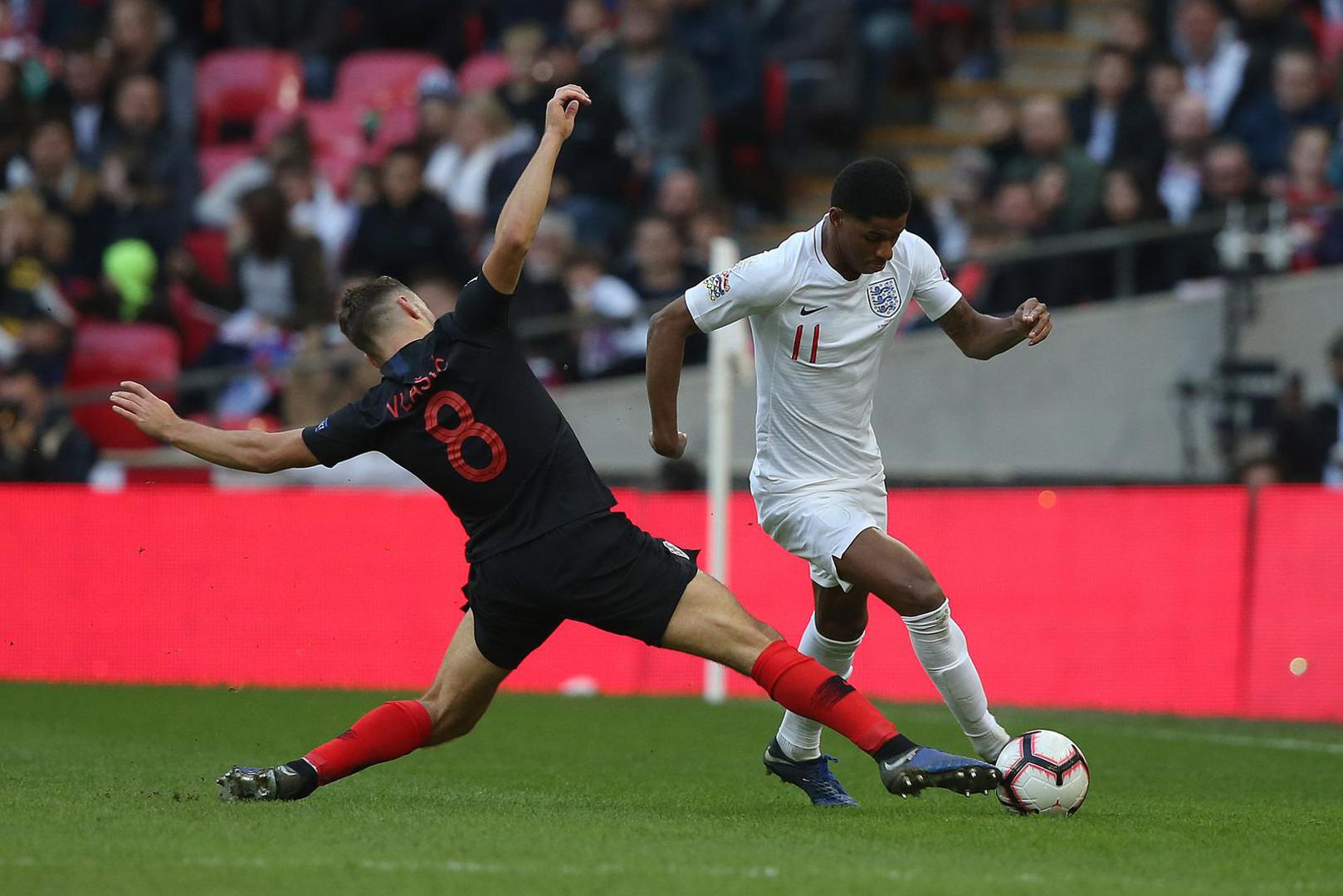 ENG, UEFA Nations League, England vs Kroatien 18.11.2018, Wembley Station, London, ENG, UEFA Nations League, England vs Kroatien, Liga A, Gruppe 4, im Bild Nikola Vlasic of Croatia and Marcus Rashford of England in action // Nikola Vlasic of Croatia and Marcus Rashford of England in action during the Nations League, League A, Group 4 match between England and Croatia at the Wembley Station in London, England on 2018/11/18. EXPA Pictures © 2018, PhotoCredit: EXPA/ Focus Images/ Paul Chestertonr"nr"n*****ATTENTION - for AUT, GER, FRA, ITA, SUI, POL, CRO, SLO only***** EXPA/ Focus Images/ Paul Chesterton 