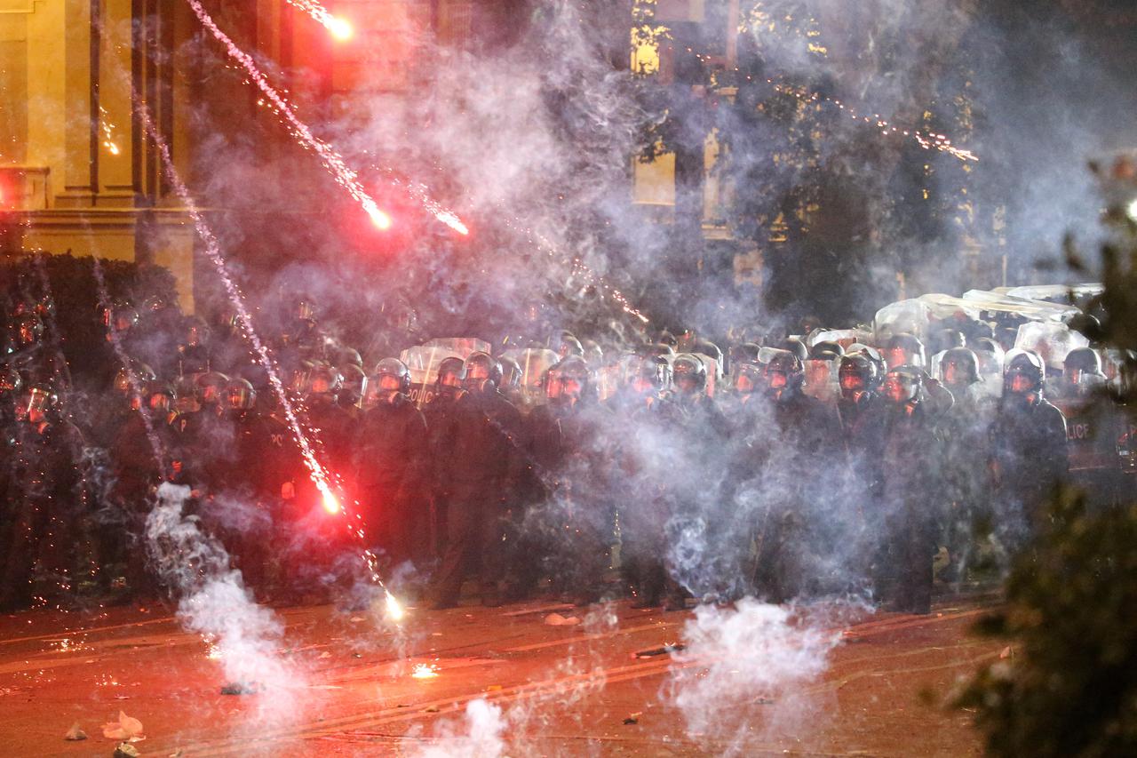 Georgian opposition supporters protest against government's EU application delay, in Tbilisi