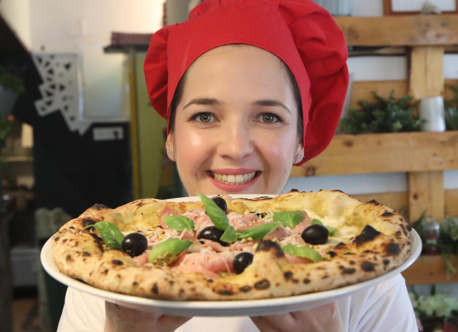 23.07.2024.,Pirovac-- Turisticka patrola i Vecernjakove zvjezdice uPirovcu. Pizzerija "Barezze"pizza majstorica Matea Baric. Photo: Dusko Jaramaz/PIXSELL