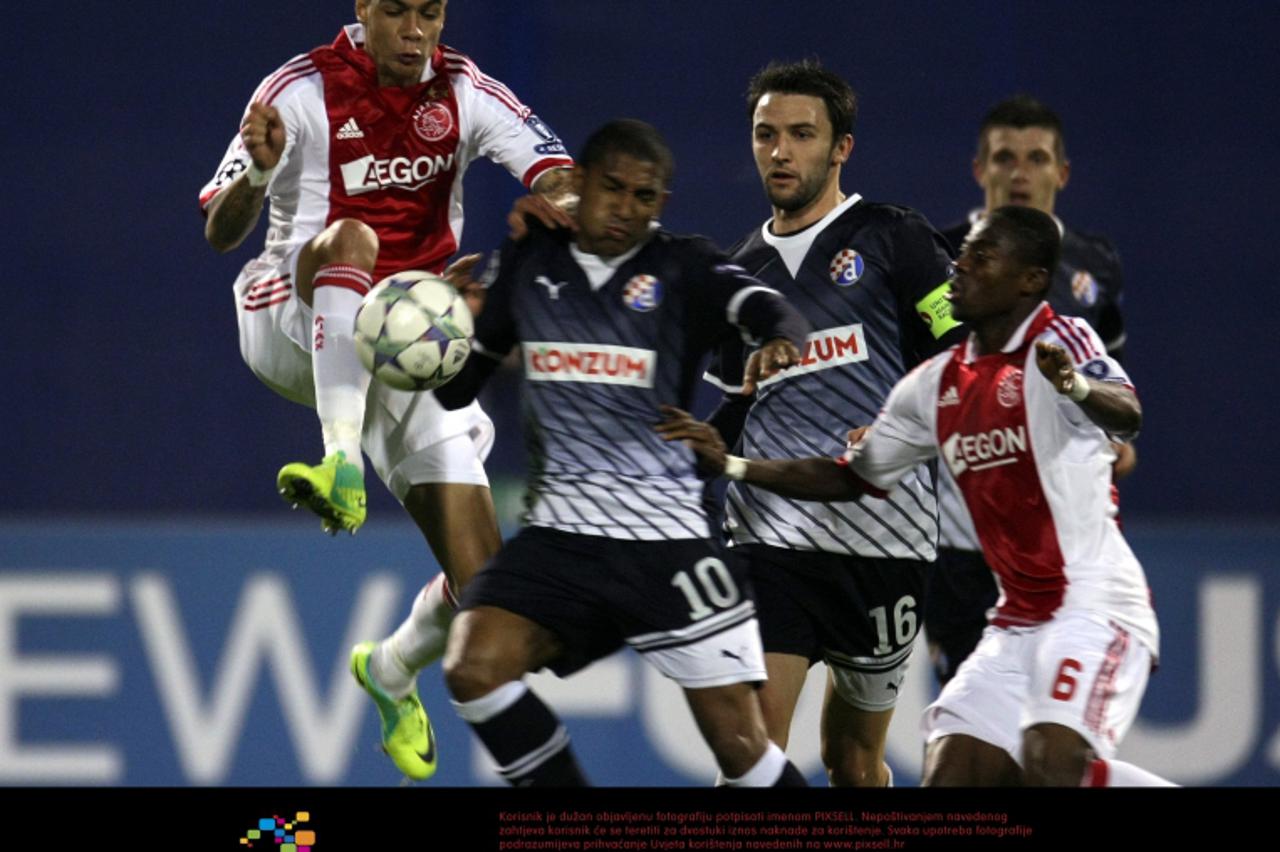 '18.10.2011., Maksimir, Zagreb - Nogometna utakmica 3. kola skupine D Lige prvaka, GNK Dinamo - Ajax.  Sammir, Gregory van der Wiel, Eyong Enoh, Milan Badelj. Photo: Sanjin Strukic/PIXSELL'