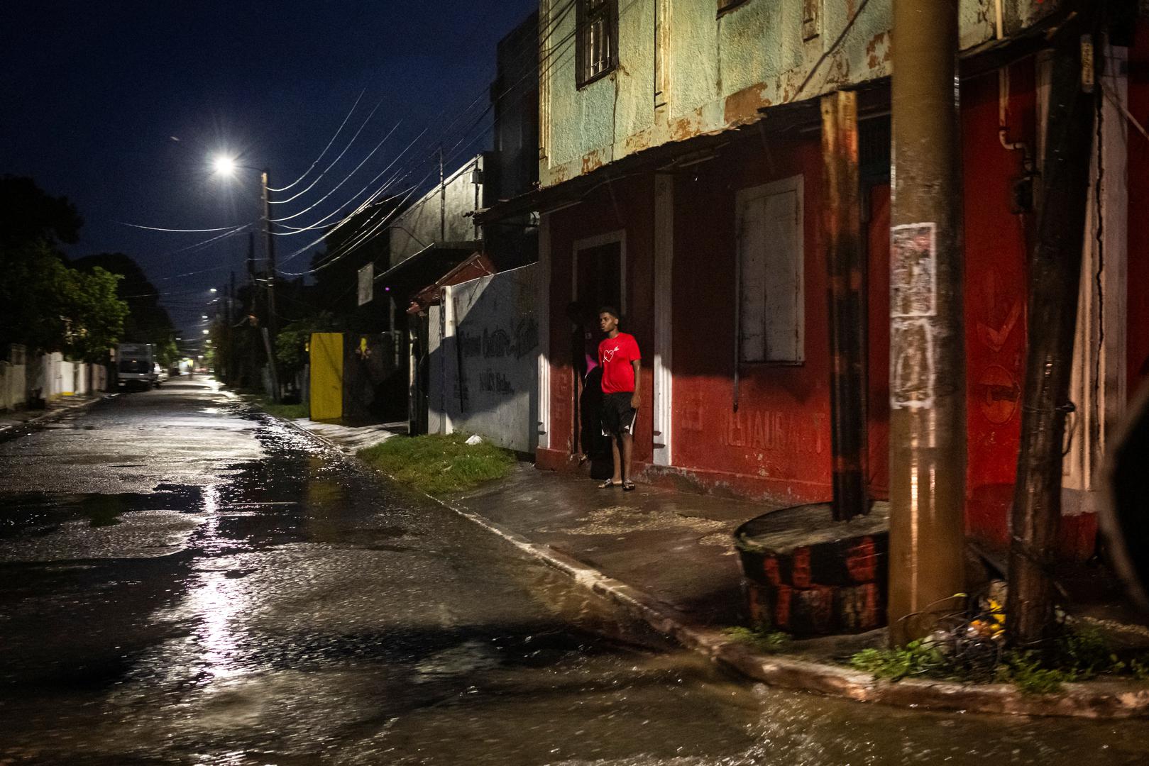 A man looks at a flooded street as Hurricane Beryl hits the southern coast of the island, in Kingston, Jamaica, July 3, 2024. REUTERS/Marco Bello Photo: MARCO BELLO/REUTERS