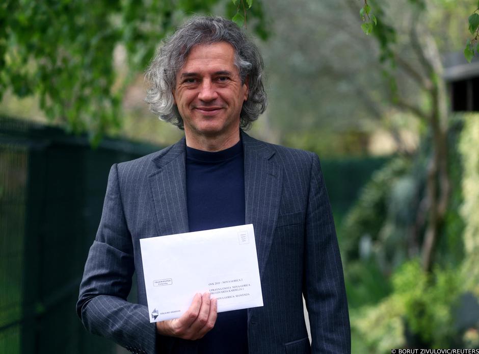 Slovenian parliamentary candidate Robert Golob casts his vote through post during the general elections, in Nova Gorica