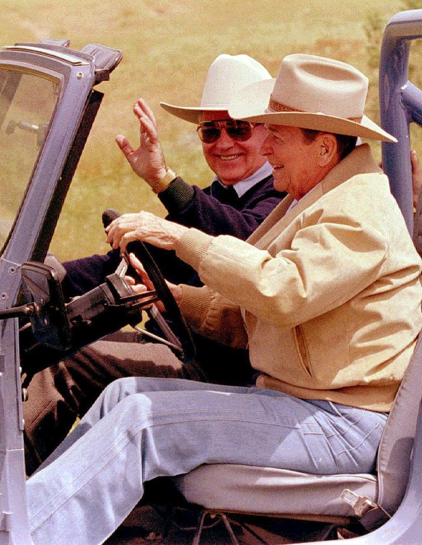 FILE PHOTO: Former U.S. President Ronald Reagan takes former Soviet President Mikhail Gorbachev for a drive in his Jeep to tour the Reagan ranch in the Santa Ynez mountains near Santa Barbara, May 3, 1992. REUTERS/File Photo Photo: Reuters Photographer/REUTERS