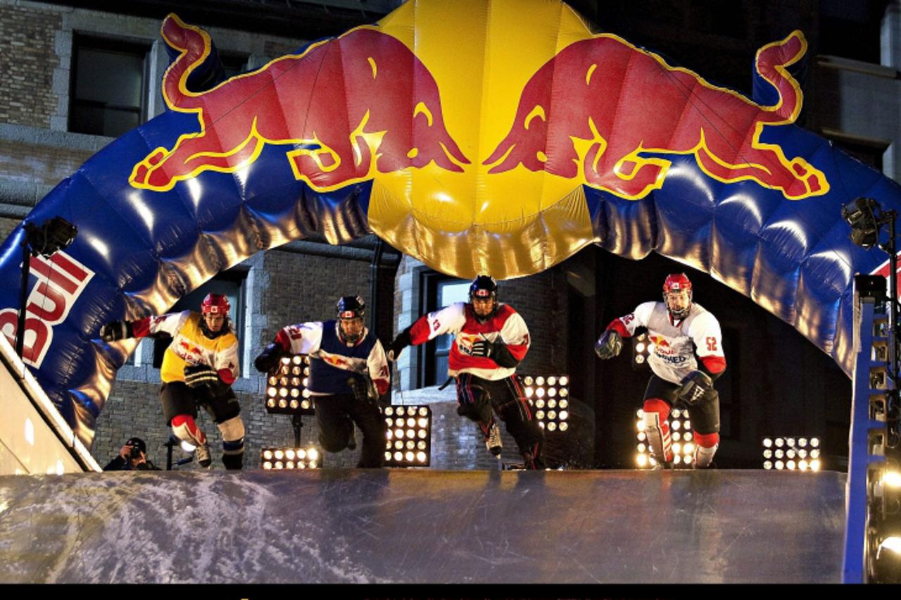 \'Four racers make their way down the iced up hill by the Chateau Frontenac Saturday March 20, 2010 at the Red Bull Crashed Ice competition in Quebec City. THE CANADIAN PRESS/Jacques Boissinot Photo: 