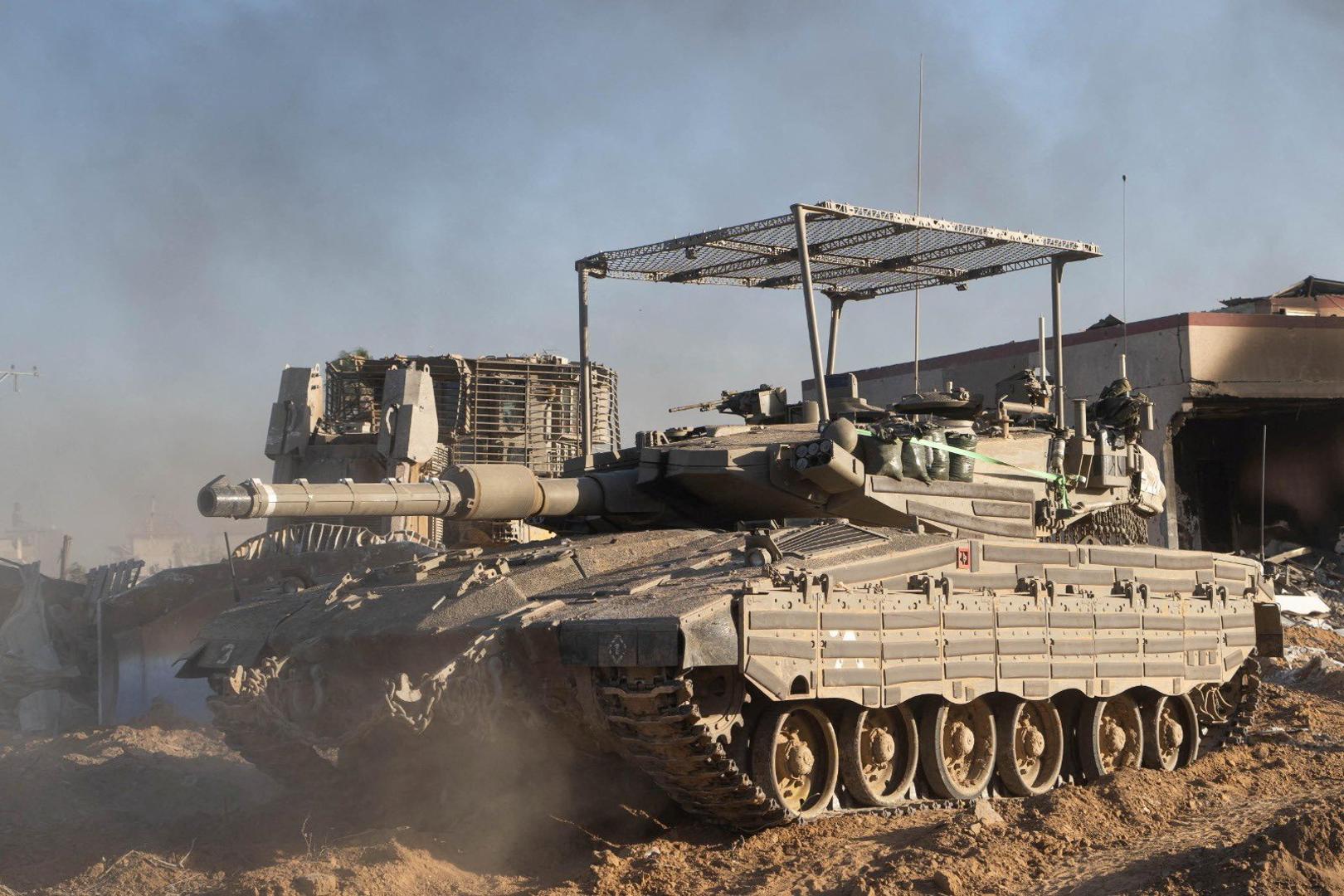 A Merkava tank is seen as Israeli soldiers operate in the Gaza Strip amid the ongoing conflict between Israel and the Palestinian Islamist group Hamas, in this handout picture released on January 14, 2024.  Israel Defense Forces/Handout via REUTERS    THIS IMAGE HAS BEEN SUPPLIED BY A THIRD PARTY Photo: ISRAEL DEFENSE FORCES/REUTERS