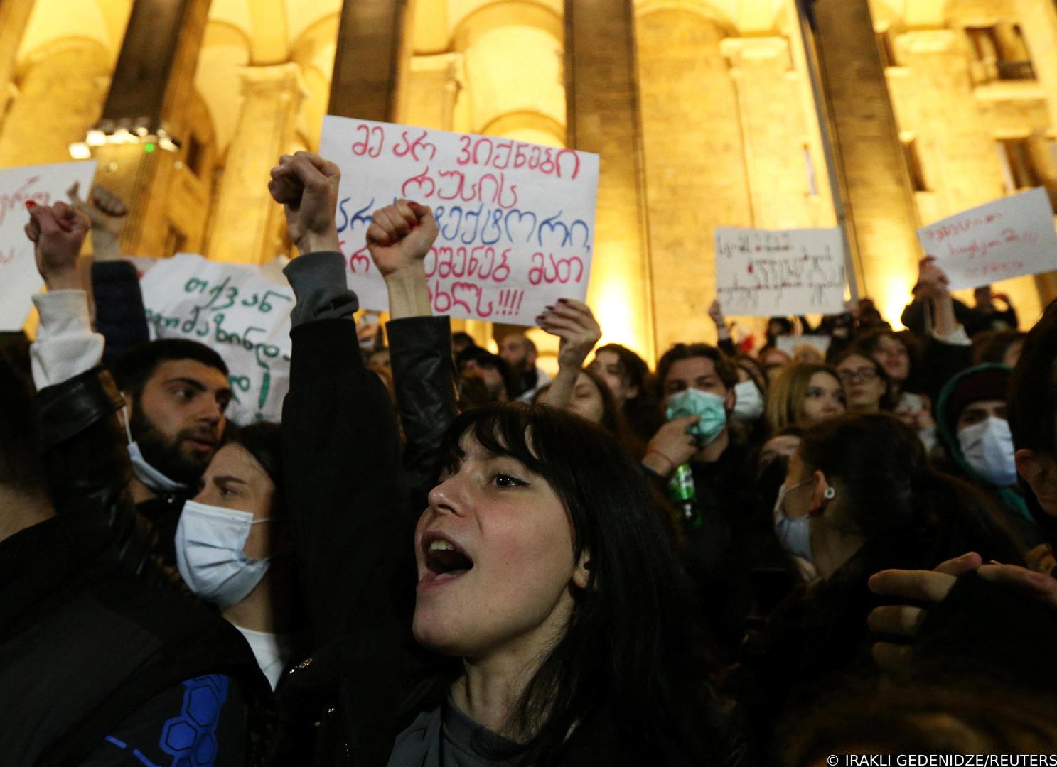 People take part in a protest demanding the government formally denounce the "foreign agents" bill, outside the parliament building in Tbilisi, Georgia March 9, 2023. REUTERS/Irakli Gedenidze Photo: IRAKLI GEDENIDZE/REUTERS