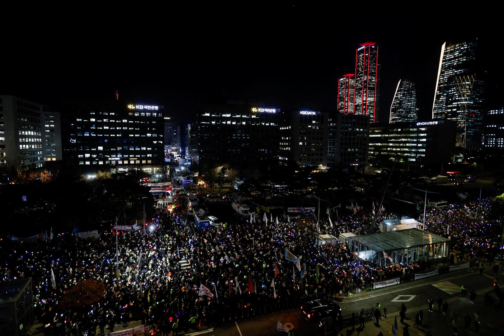 Protesters attend a rally calling for the impeachment of South Korean President Yoon Suk Yeol, who declared martial law, which was reversed hours later, in Seoul, South Korea, December 9, 2024.  REUTERS/Kim Kyung-Hoon Photo: KIM KYUNG-HOON/REUTERS