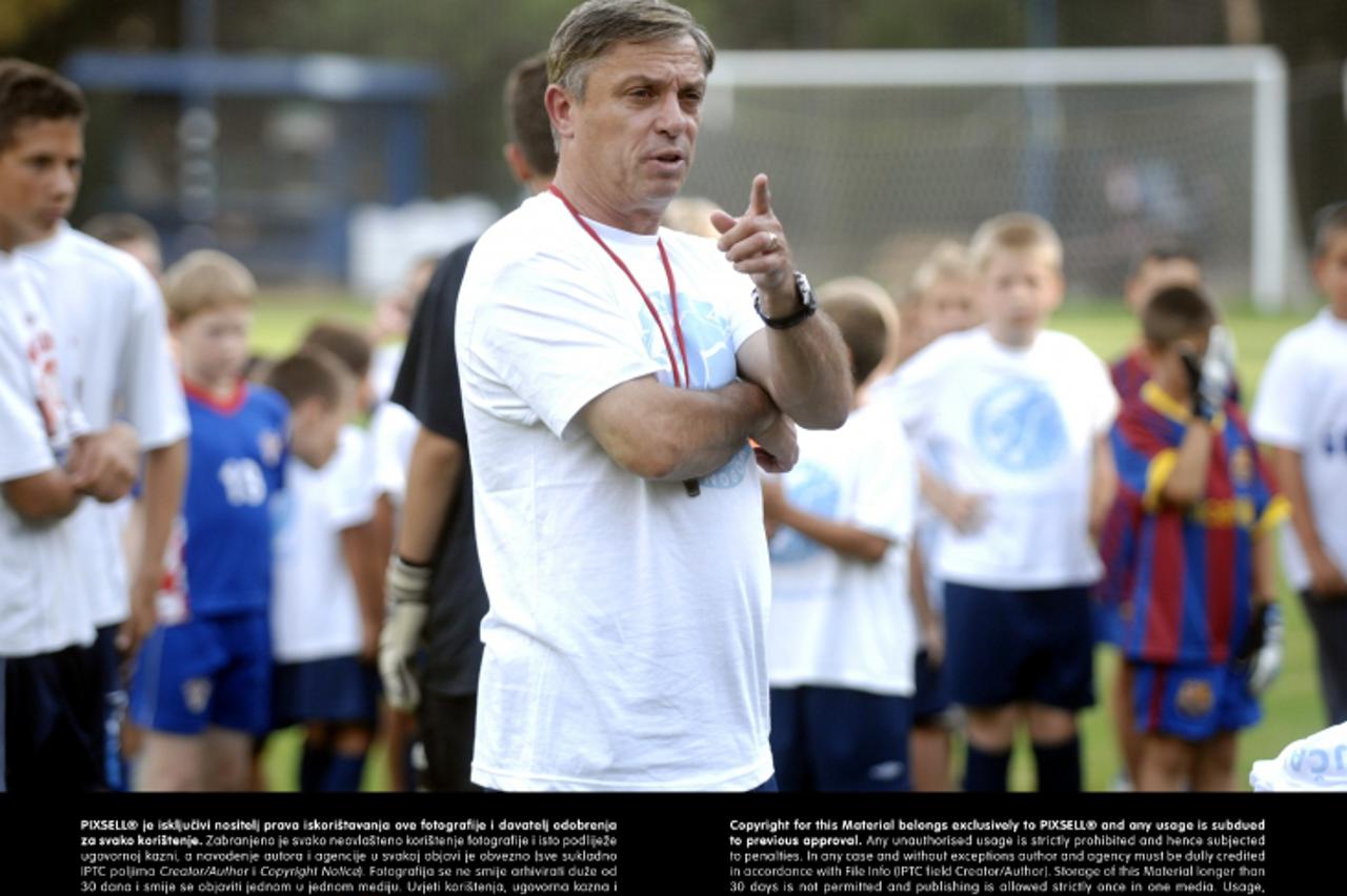 '30.06.2011. Mali Losinj - Skola nogometa Kranjcar. Niko i Zlatko Cico Kranjcar odrzali su prvi trening sa polaznicima skole nogometa. Photo: Goran Kovacic/PIXSELL'