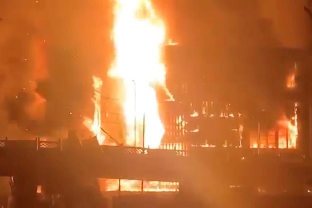 Ruby Mart is engulfed in flames, in Yangon