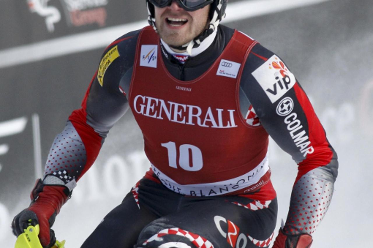 \'Natko Zrncic-Dim of Croatia reacts after placing second in the men\'s Alpine Skiing World Cup super combined event in Les Houches near Chamonix, French Alps January 30, 2011. REUTERS/Robert Pratta (