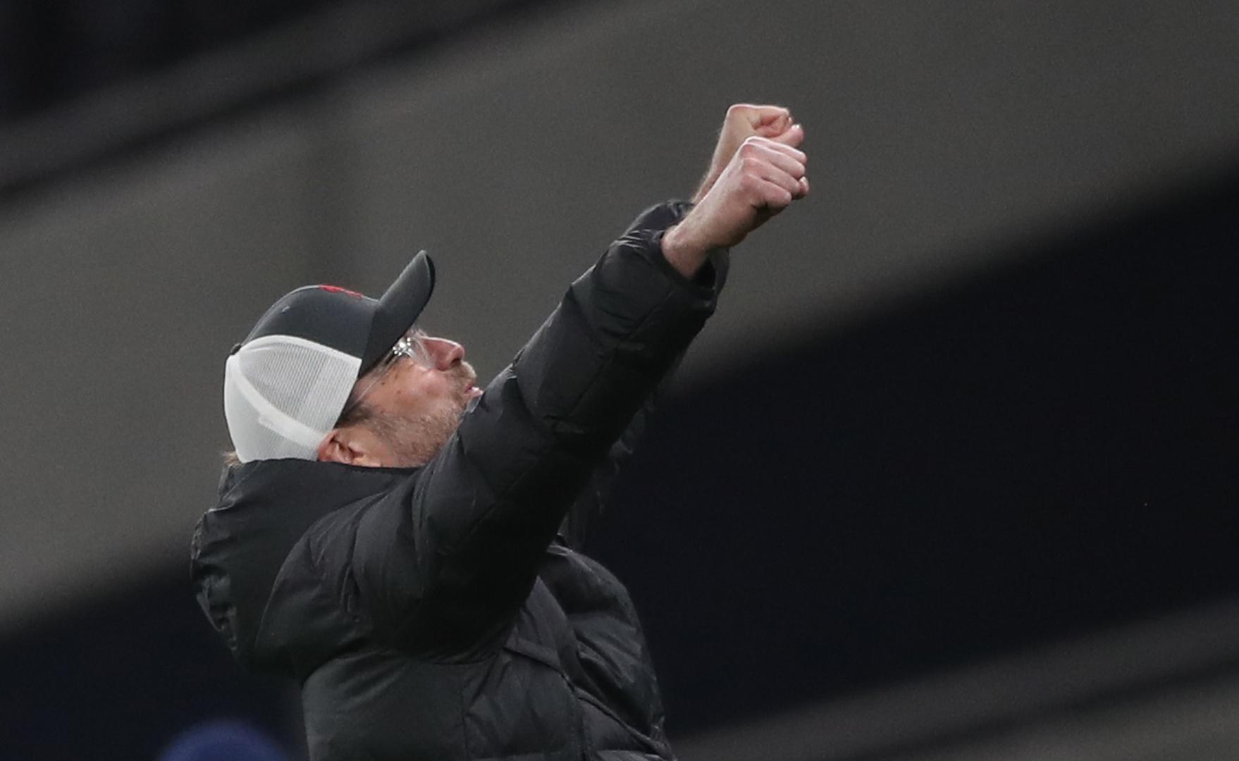 Premier League - Tottenham Hotspur v Liverpool Soccer Football - Premier League - Tottenham Hotspur v Liverpool - Tottenham Hotspur Stadium, London, Britain - January 28, 2021 Liverpool manager Juergen Klopp celebrates their first goal scored by Liverpool's Roberto Firmino Pool via REUTERS/Nick Potts EDITORIAL USE ONLY. No use with unauthorized audio, video, data, fixture lists, club/league logos or 'live' services. Online in-match use limited to 75 images, no video emulation. No use in betting, games or single club /league/player publications.  Please contact your account representative for further details. NICK POTTS