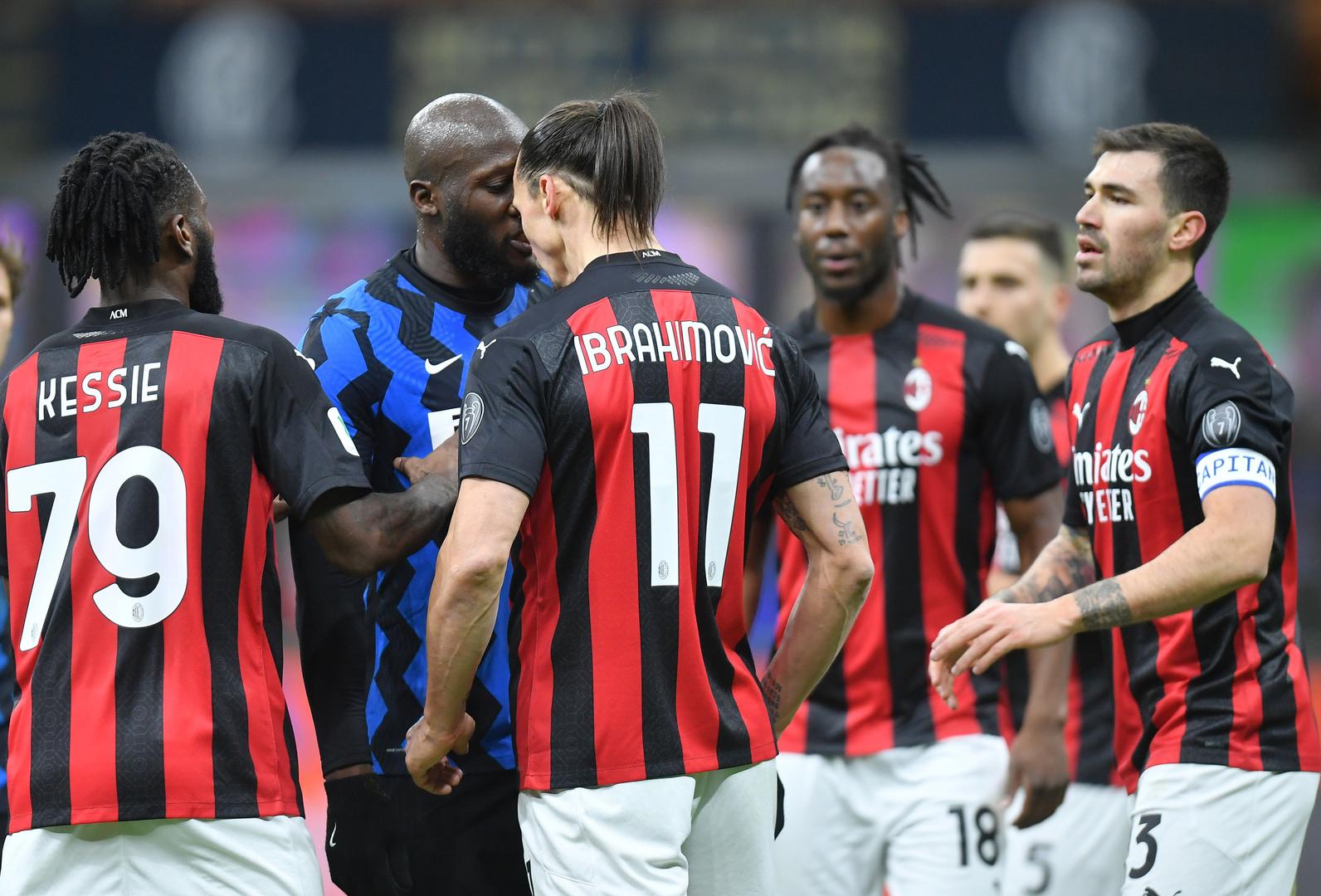 Coppa Italia - Quarter Final - Inter Milan v AC Milan Soccer Football - Coppa Italia - Quarter Final - Inter Milan v AC Milan - San Siro, Milan, Italy - January 26, 2021 AC Milan's Zlatan Ibrahimovic clashes with Inter Milan's Romelu Lukaku REUTERS/Daniele Mascolo DANIELE MASCOLO