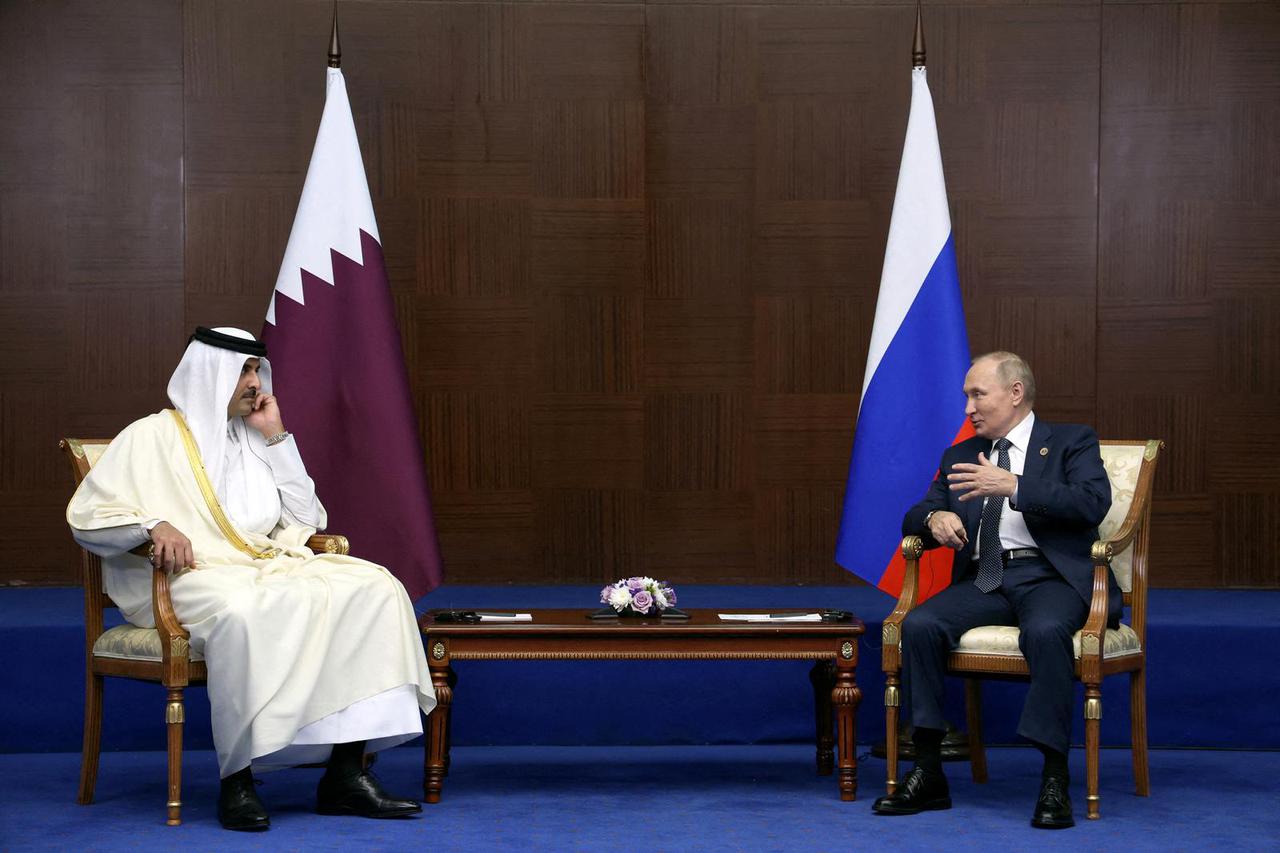 Russia's President Vladimir Putin and Qatar's Emir, Sheikh Tamim bin Hamad al-Thani meet on the sidelines CICA summit in Astana