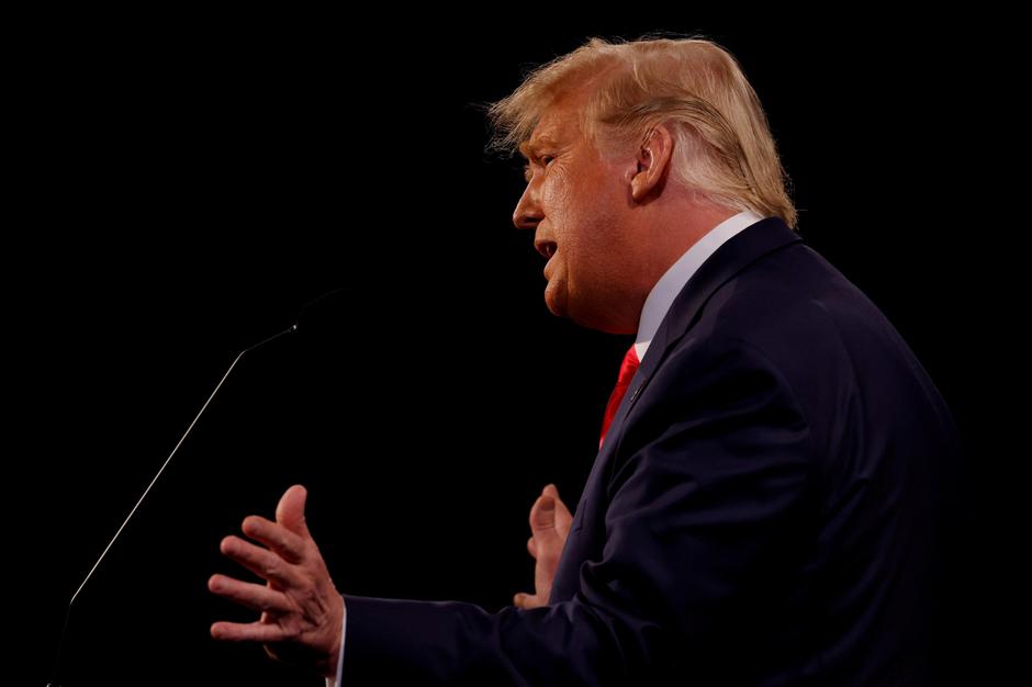 FILE PHOTO: U.S. President Trump and Democratic presidential nominee Biden participate in second debate in Nashville, tennessee