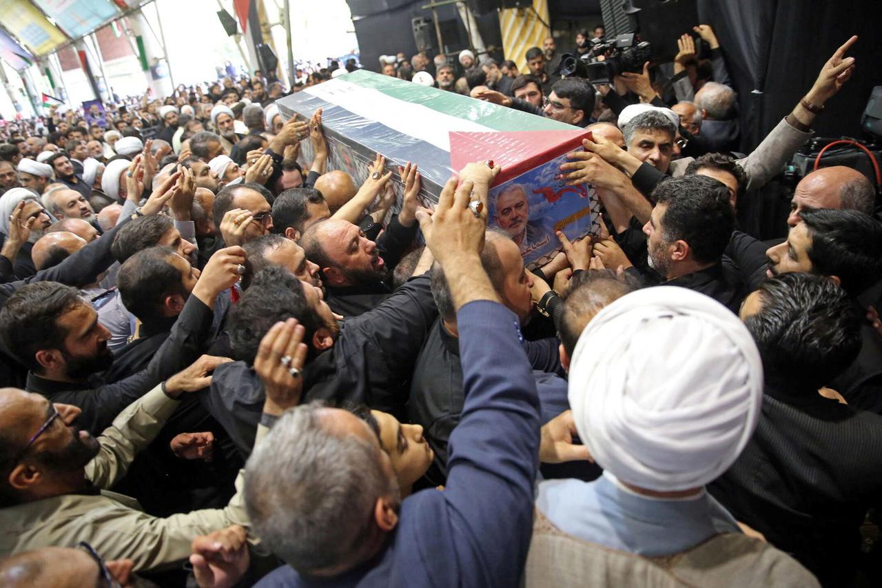 Mourners carry the coffin of assassinated Hamas chief, Ismail Haniyeh during his funeral ceremony in Tehran