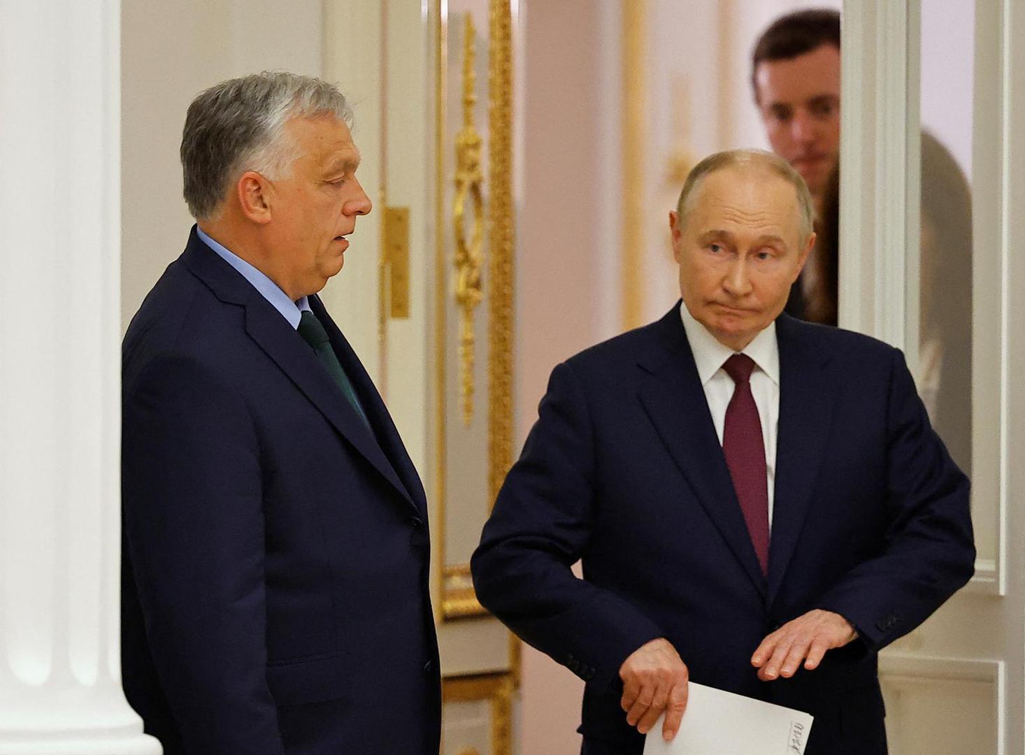 Hungary's Prime Minister Viktor Orban and Russia's President Vladimir Putin arrive for a press conference following their meeting in Moscow, Russia July 5, 2024. REUTERS/Evgenia Novozhenina Photo: EVGENIA NOVOZHENINA/REUTERS