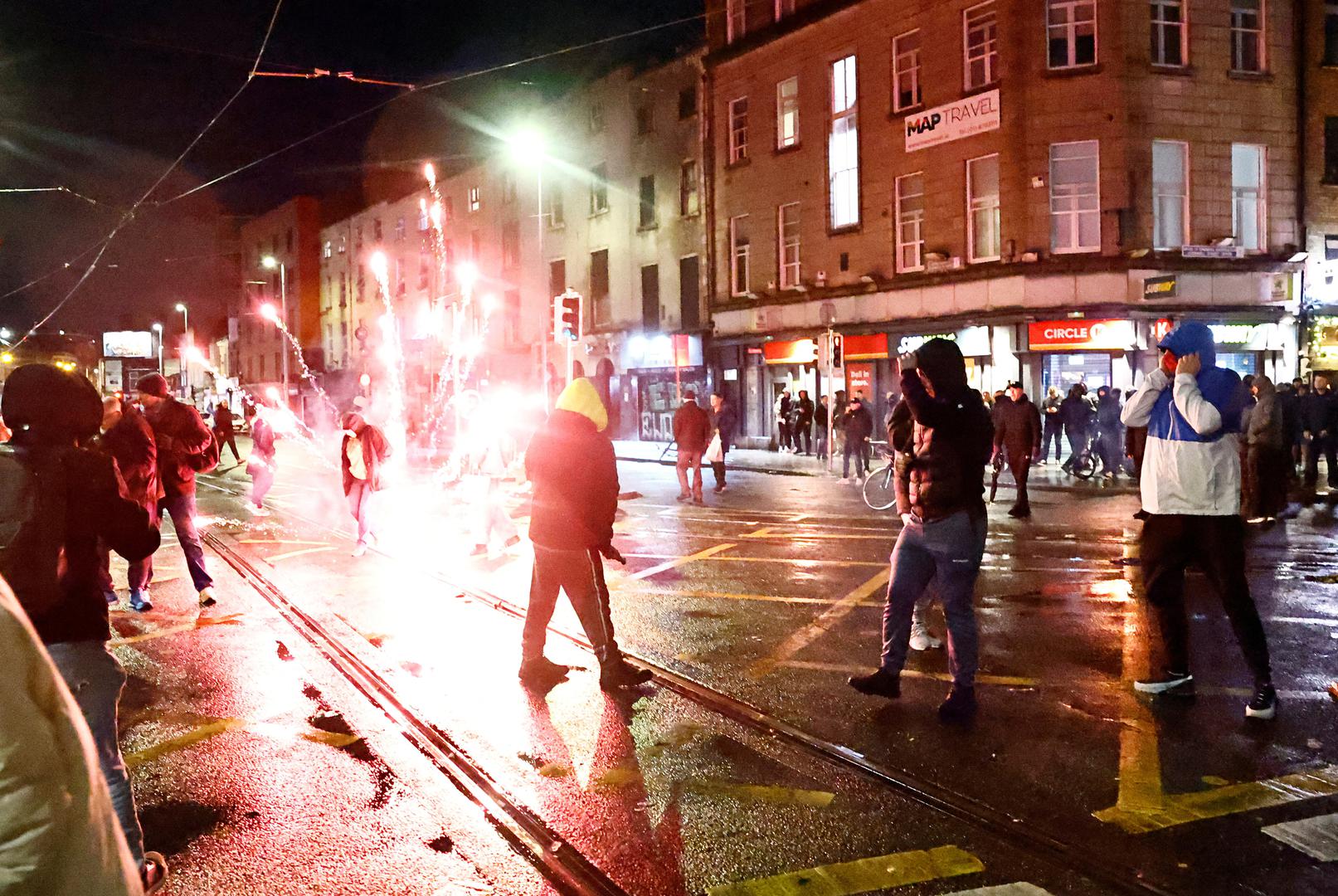 People gather near the scene of a suspected stabbing that left few children injured in Dublin, Ireland, November 23, 2023. REUTERS/Clodagh Kilcoyne Photo: Clodagh Kilcoyne/REUTERS