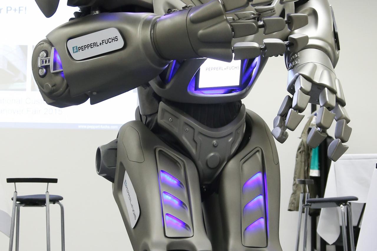 Robot Titan catches the attention of exhibition visitors at the Hannover Messe industrial trade fair in Hanover, Germany, 13 April 2015. The exhibition runs from 13 April until 17 April 2015. This year's partner country is India. Photo:?FRISO?GENTSCH/dpa/