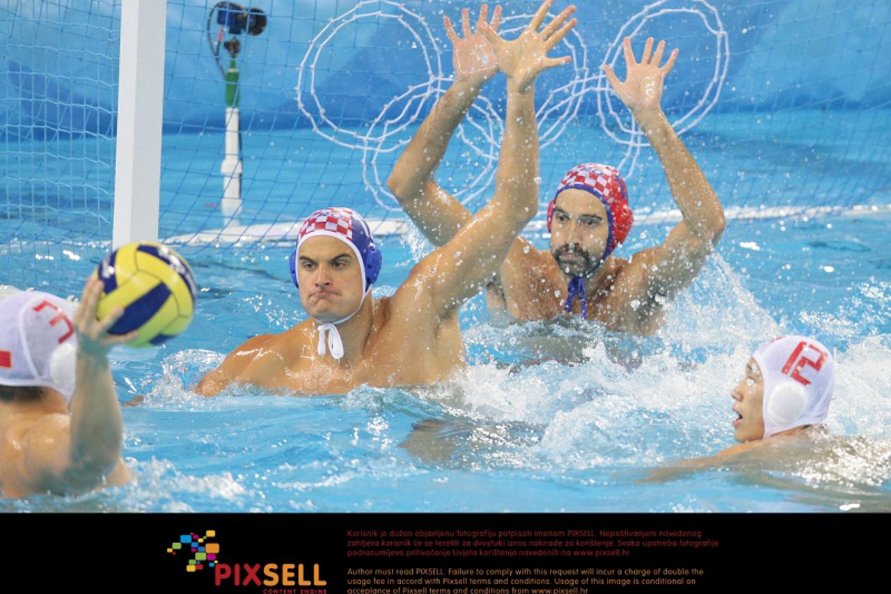 '18. 08. 2008., beijing, china - na olimpijadi je hrvatska reprezentacija zaigrala protiv kineske, s rezultatom 16-4. na fotografiji su miho boskovic i josip pavic.  photo: Zeljko Lukunic/24sata'