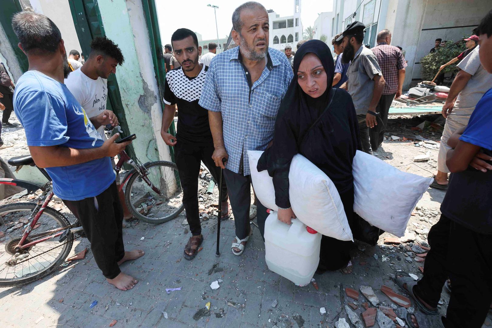 Palestinians leave a school sheltering displaced people following an Israeli strike, amid Israel-Hamas conflict, in Deir Al-Balah in the central Gaza Strip, July 27, 2024. REUTERS/Ramadan Abed Photo: Ramadan Abed/REUTERS